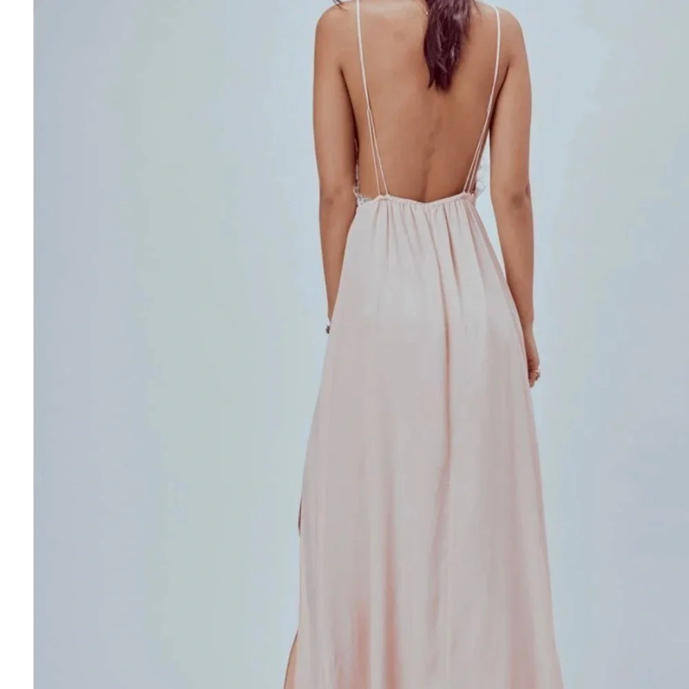Elegant  Lace Maxi Dress by Free People lovebird. dress is white! Not blush
